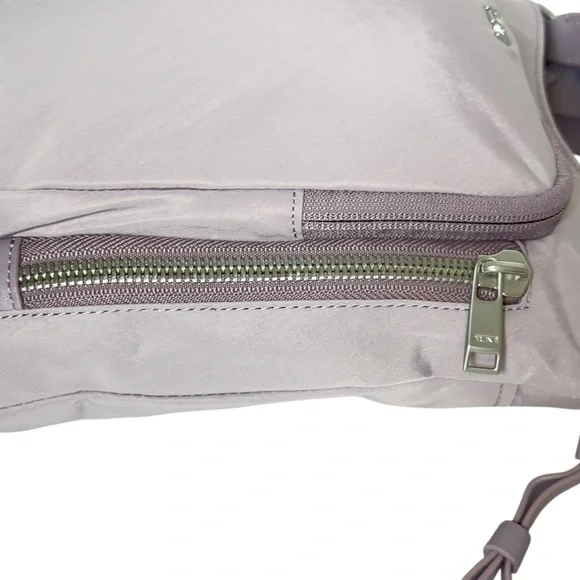 TUMI Voyageur Tyler Crossbody Organizer Pockets Bag in Lilac - Picture 8 of 16